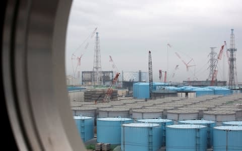 Tepco was forced to admit that around 80 per cent of the water stored at the Fukushima site still contains radioactive substances above legal levels  - Credit:  REUTERS