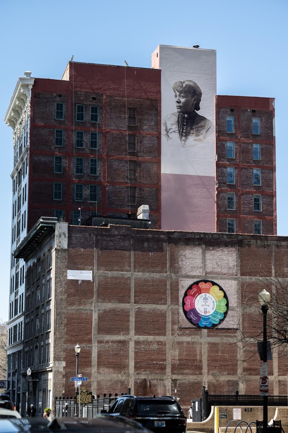Original Photograph provided by the Portland Museum of Kentucky via a relative of Henrietta, Phillip Cherry. Hand-painted mural in Louisville, KY. Located on the corner of 5th ave. and Muhammad Ali Blvd.