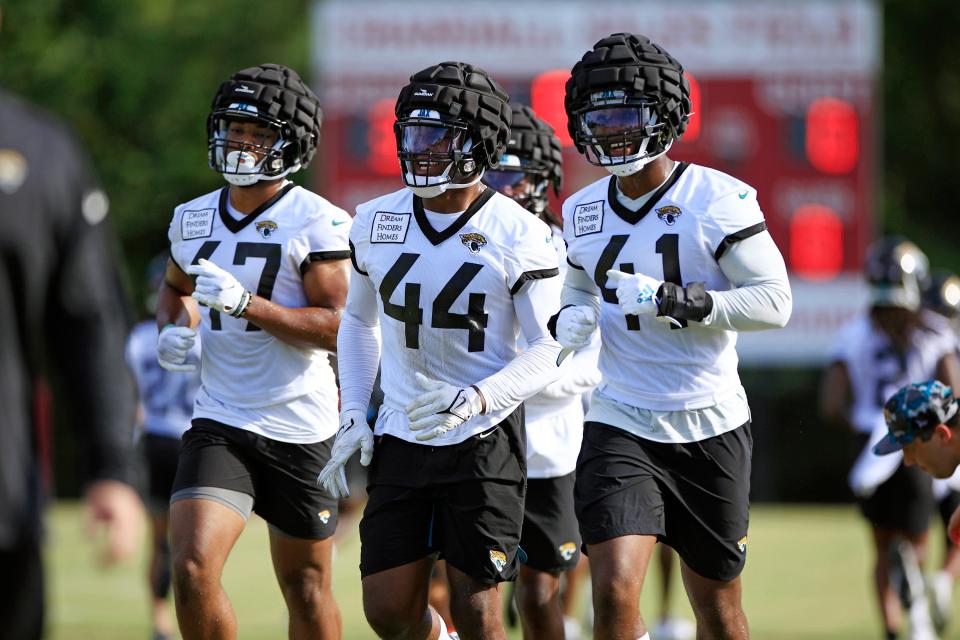 Jacksonville Jaguars outside linebacker De'Shaan Dixon (47) outside linebacker Travon Walker (44) and defensive end/outside linebacker Josh Allen (41) run during day 2 of the Jaguars Training Camp Tuesday, July 26, 2022 at the Knight Sports Complex at Episcopal School of Jacksonville.