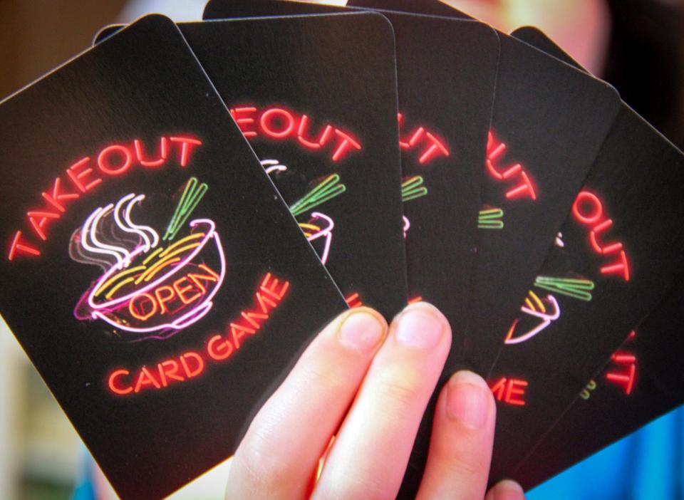 Takeout, a card game by Small Monsters Games, is for two to four players, with cards inspired by Chinese takeout restaurants. The creators of Small Monsters are based in Fall River, and sell their decks locally.