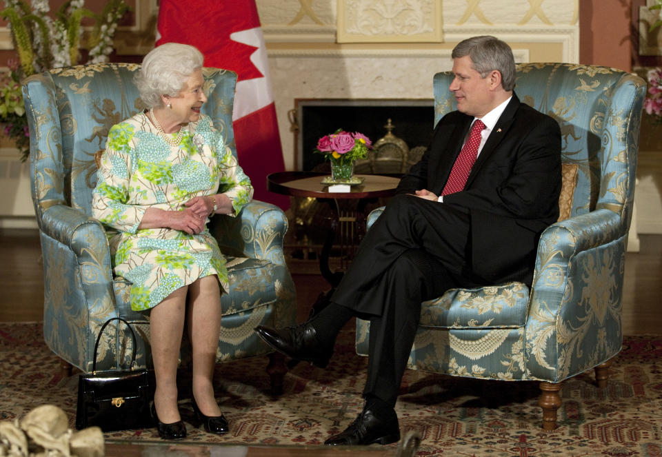 <p>Queen Elizabeth II also met with former Prime Minister Stephen Harper at Rideau Hall in Ottawa in 2010. (Photo via AFP via Getty Images)</p> 