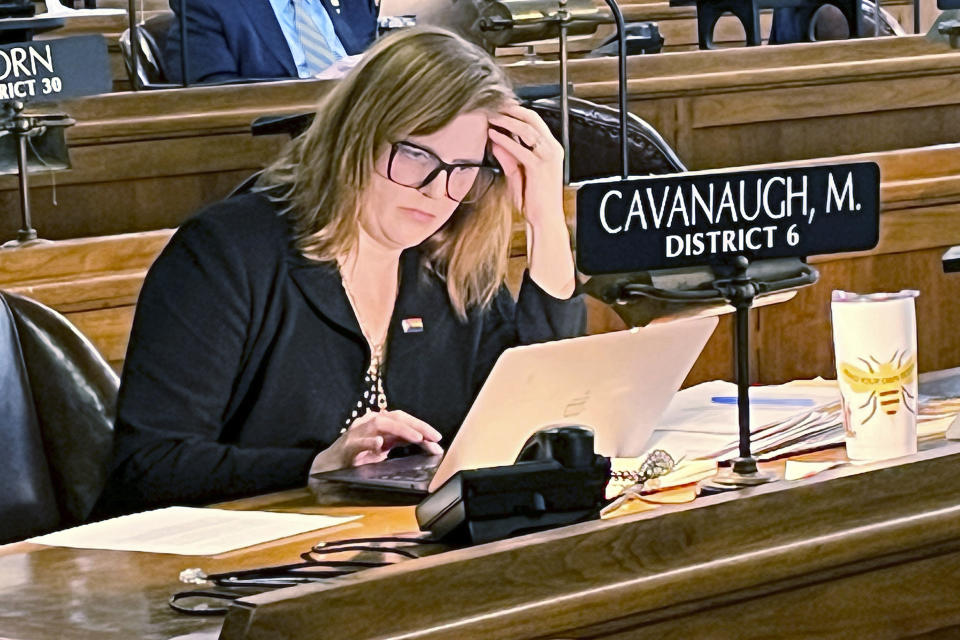 FILE - Nebraska state Sen. Machaela Cavanaugh prepares to speak before the Nebraska Legislature, March 13, 2023, at the Nebraska state Capital in Lincoln, Neb. In an announcement on Wednesday, April 3, 2024, Neb. State Sen. Steve Halloran, who invoked the Cavanaugh's name while reading a graphic account of rape on the floor of the Legislature violated the body’s workforce sexual harassment policy, will be issued a letter of reprimand by the body's governing board. (AP Photo/Margery Beck, File)