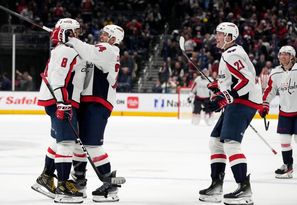 Dec. 201, 2023; Columbus, Ohio, USA; 
Washington Capitals left wing Alex Ovechkin (8) scores in overtime to end Thursday's hockey game against the Columbus Blue Jackets at Nationwide Arena.