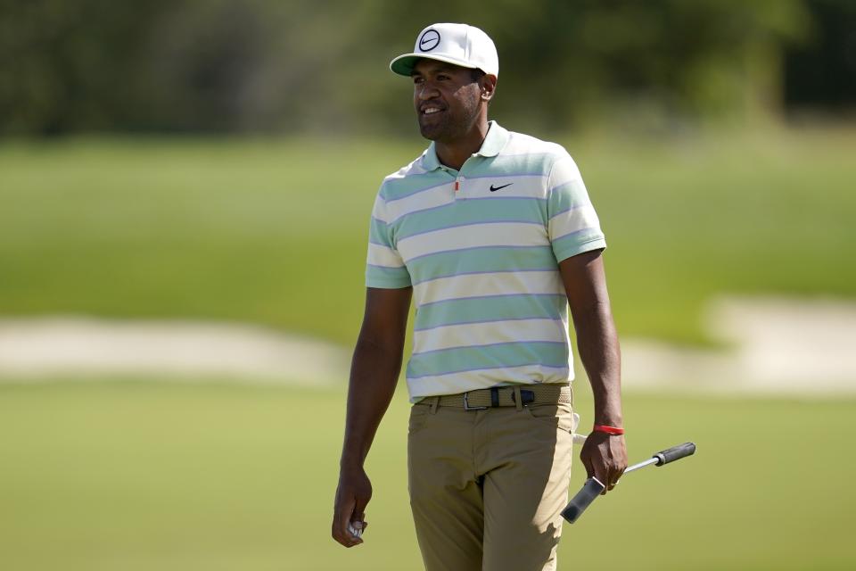 Tony Finau smiles after his putt on the 17th green during the final round of the 3M Open golf tournament at the Tournament Players Club in Blaine, Minn., Sunday, July 24, 2022. (AP Photo/Abbie Parr)