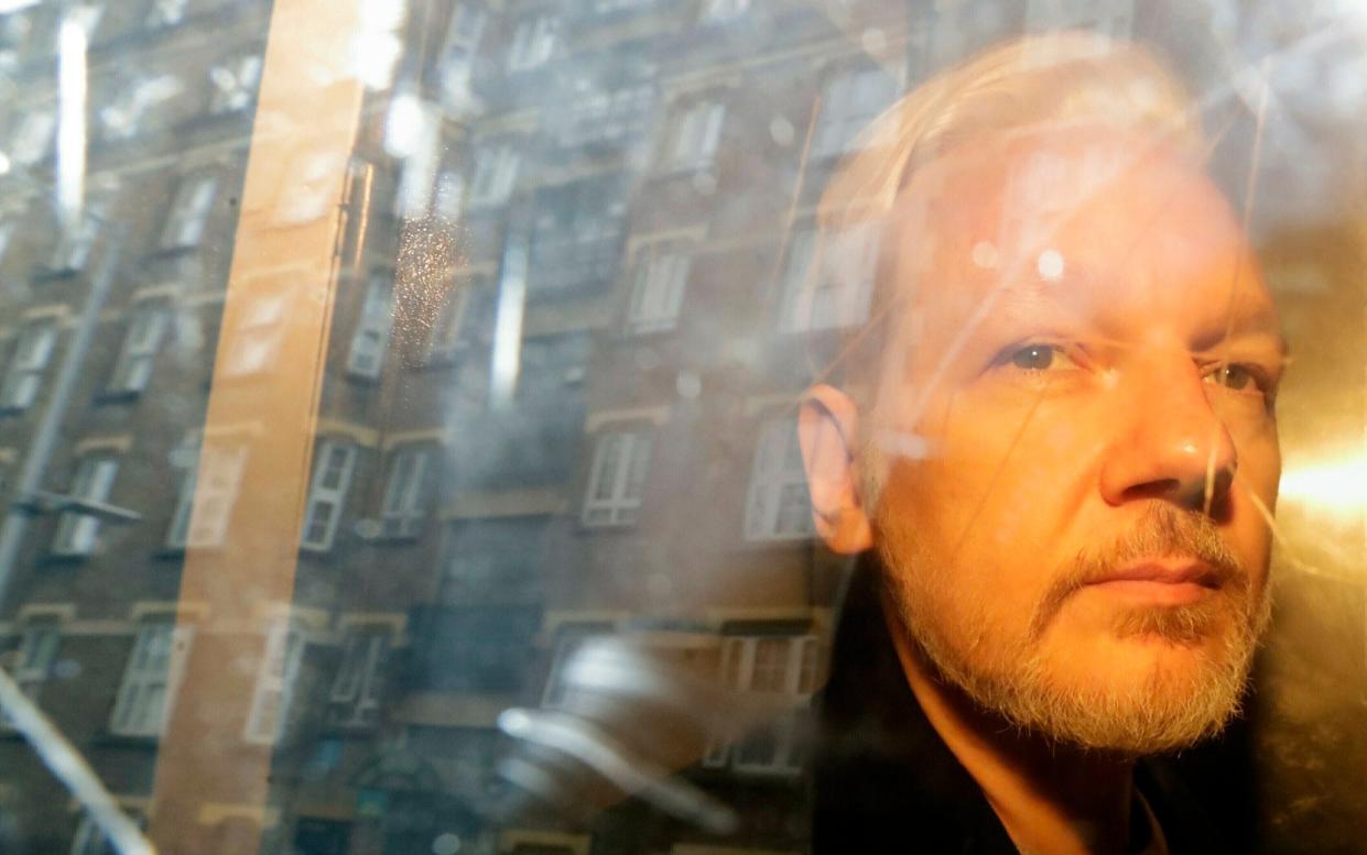Julian Assange - Matt Dunham/AP