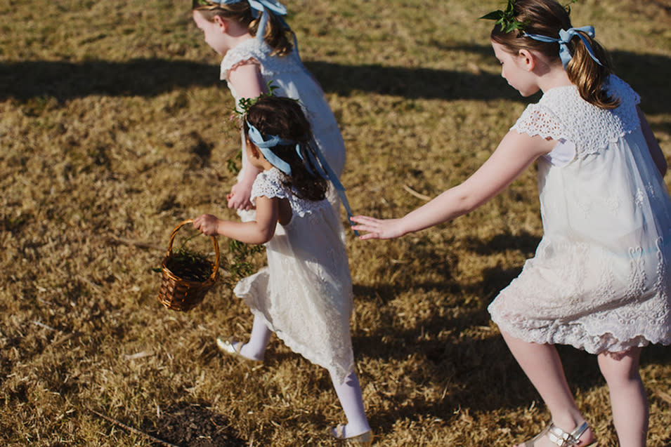 The groom’s nieces and a close friend’s daughter were the couple’s flower girls.