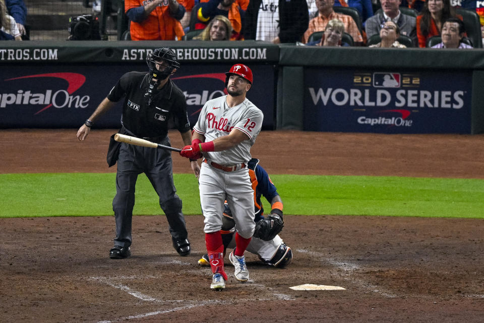 Oct 29, 2022; Houston, Texas, USA; Philadelphia Phillies left fielder Kyle Schwarber (12) and home plate umpire Pat Hoberg watch as a ball hit by Schwarber goes foul during the eighth inning during game two of the 2022 World Series at Minute Maid Park. Mandatory Credit: Jerome Miron-USA TODAY Sports