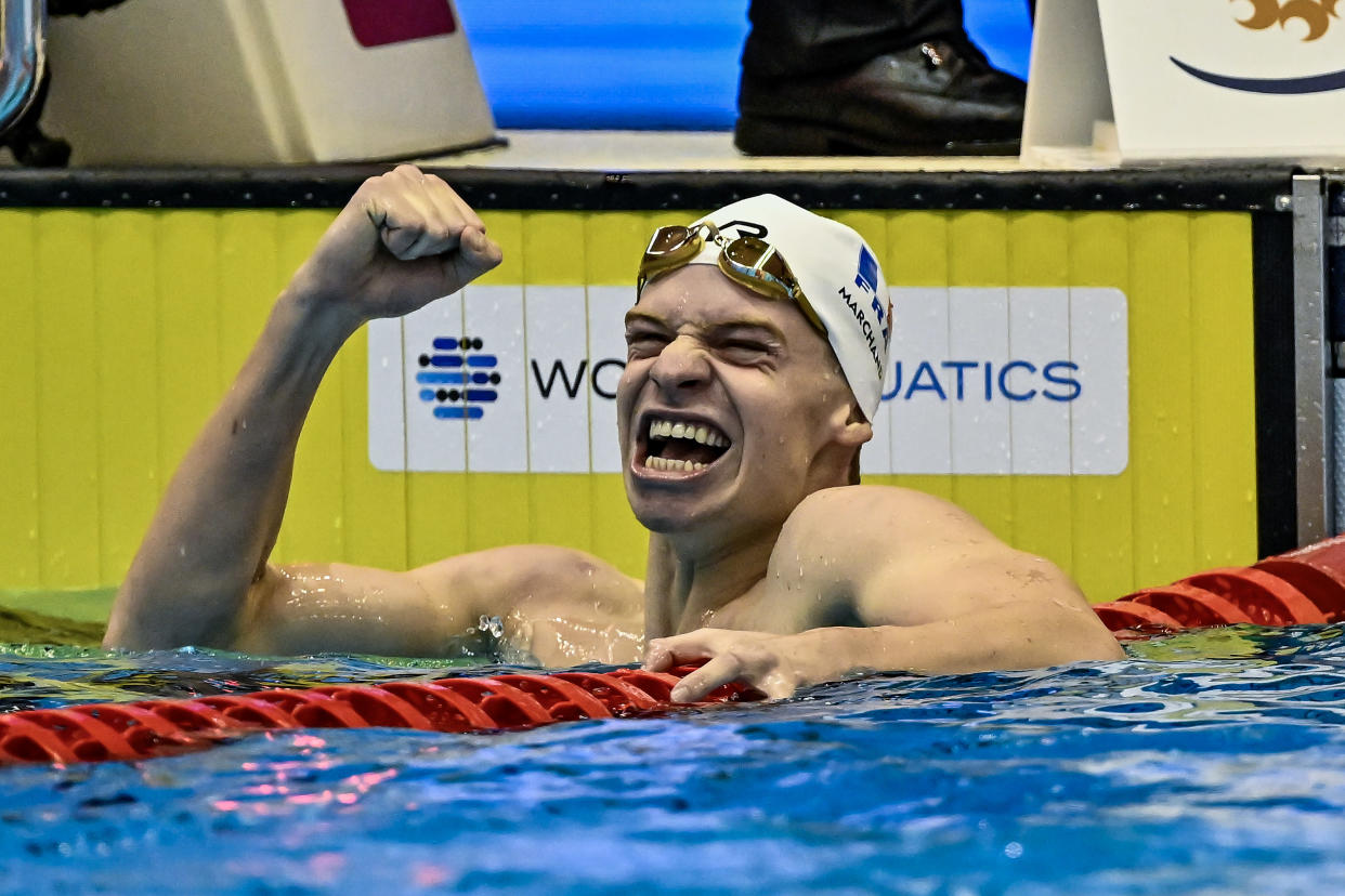 Leon Marchand of France celebrates winning a gold medal and setting a world record in the 400 IM at the 2023 World Championships. (DBM/Insidefoto/Mondadori Portfolio via Getty Images)
