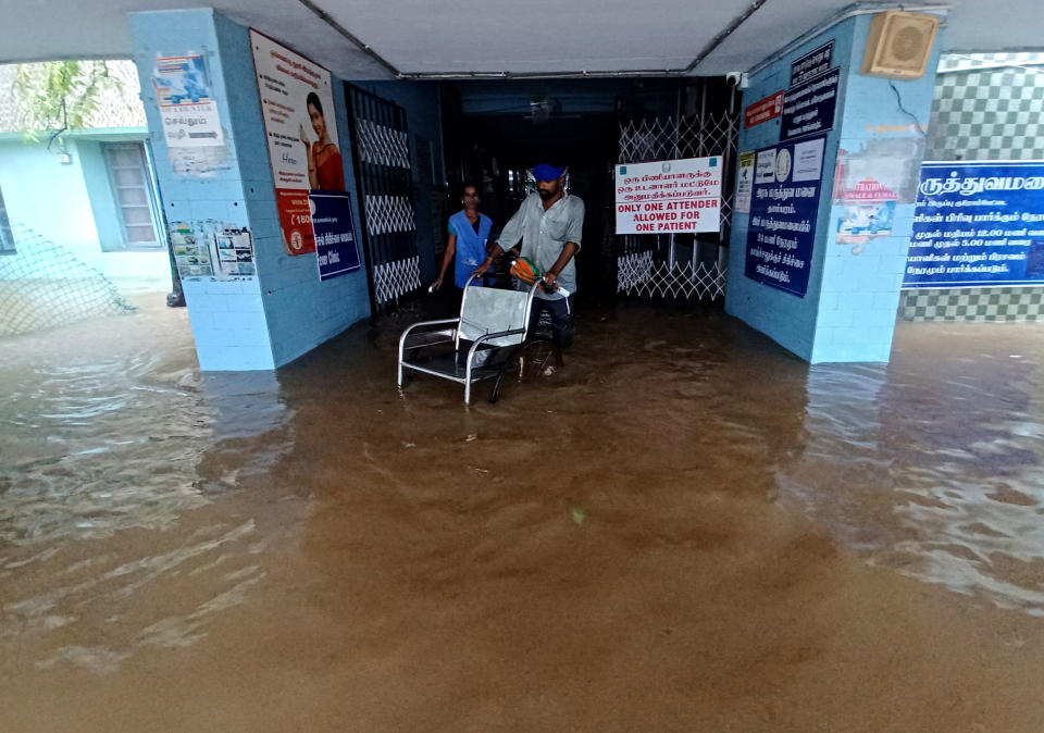 The Tambaram Government Hospital is flooded following heavy rains along the Bay of Bengal coast in Chennai, India, Monday, Dec.4, 2023. Authorities issued warnings for tropical storm Michuang, which is likely to hit the southern coast on Tuesday with maximum sustained winds of 90-100 kilometers (56-62 miles) per hour with gusts up to 110 kph (68 mph), the Indian Meteorological Department said. (AP Photo)