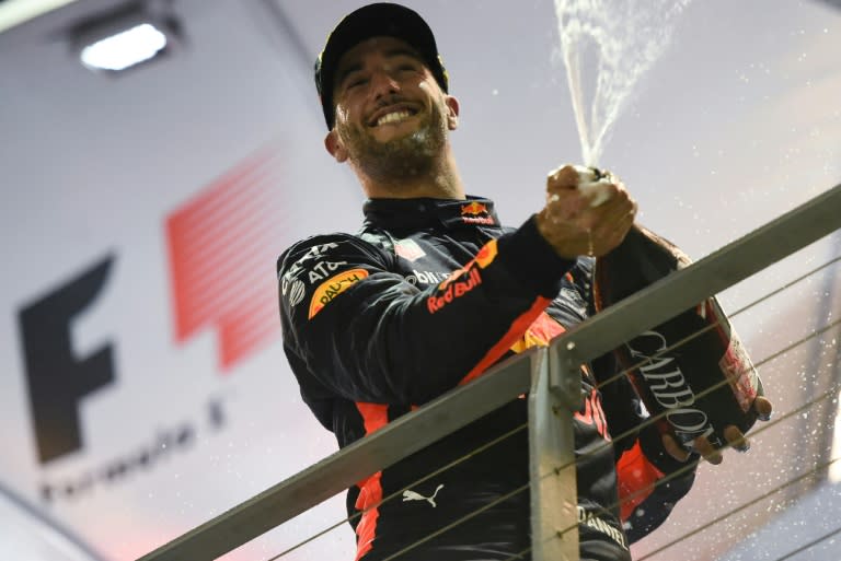 Red Bull's Daniel Ricciardo sprays champagne after finishing second in the Formula One Singapore Grand Prix last year