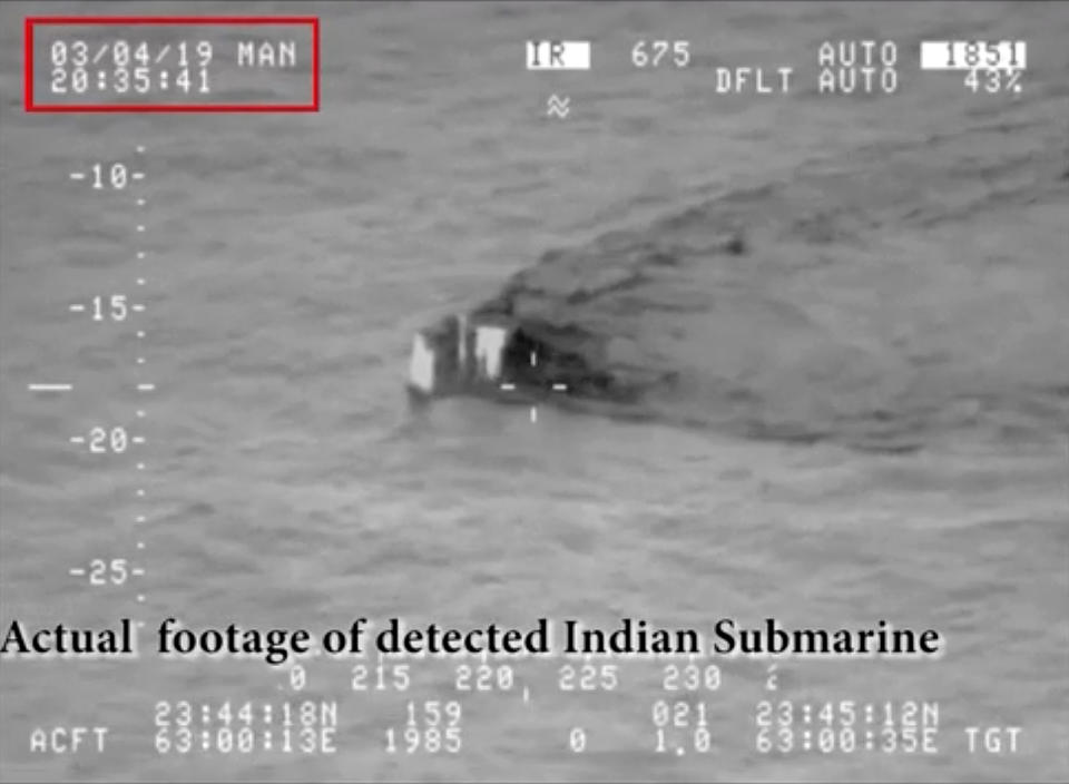 In this image made from video taken on March 4, 2019, and released on Tuesday, March 5, 2019, by the Pakistan Military, shows what they claim is an Indian submarine approaching its territorial waters in the Arabian Sea. Pakistan's navy says the submarine was not targeted, "keeping in view Pakistan's policy of peace" under which Islamabad wants to de-escalate tensions with New Delhi. (Pakistan Military via AP)