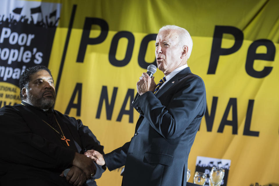 Democratic candidate Joe Biden speaks during the Poor People's Moral Action Congress forum for presidential candidates at Trinity Washington University on Monday, June 17, 2019. Rev. Dr. William J. Barber II, also appears. (Photo: Tom Williams/CQ Roll Call/Getty Images)