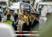 Berlin mayor Franziska Giffey visits the scene where a car crashed into a crowd of people in central Berlin, Germany, Wednesday, June 8, 2022. (AP Photo/Markus Schreiber)