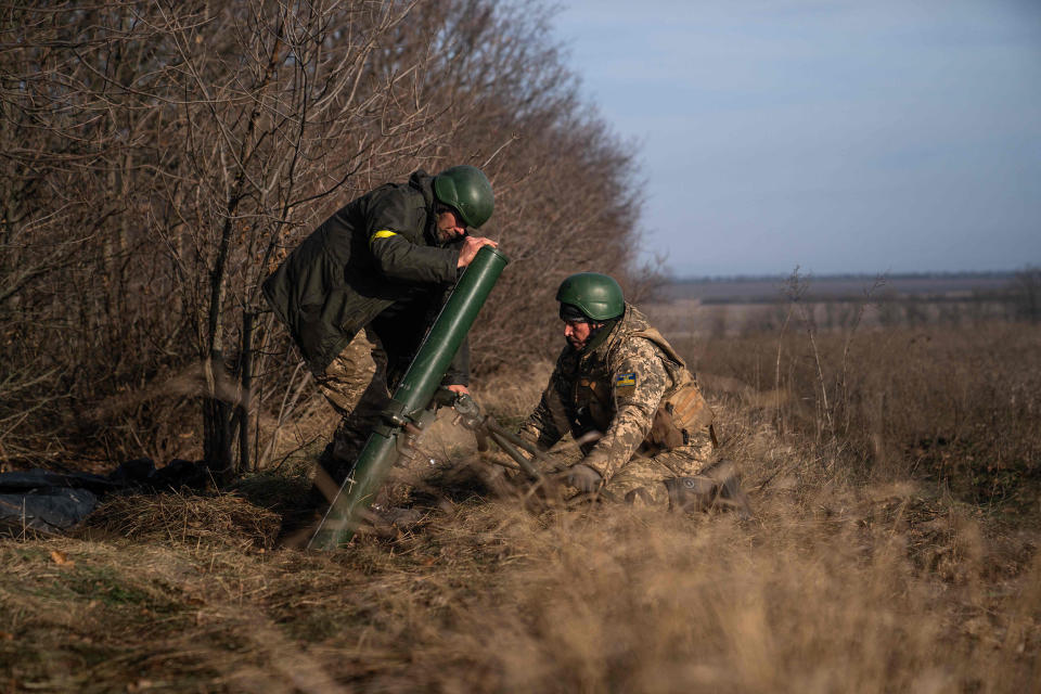 Ukrainian soldiers fire a mortar launcher at a position along the front line in Donetsk region (Ihor Tkachov / AFP - Getty Images)