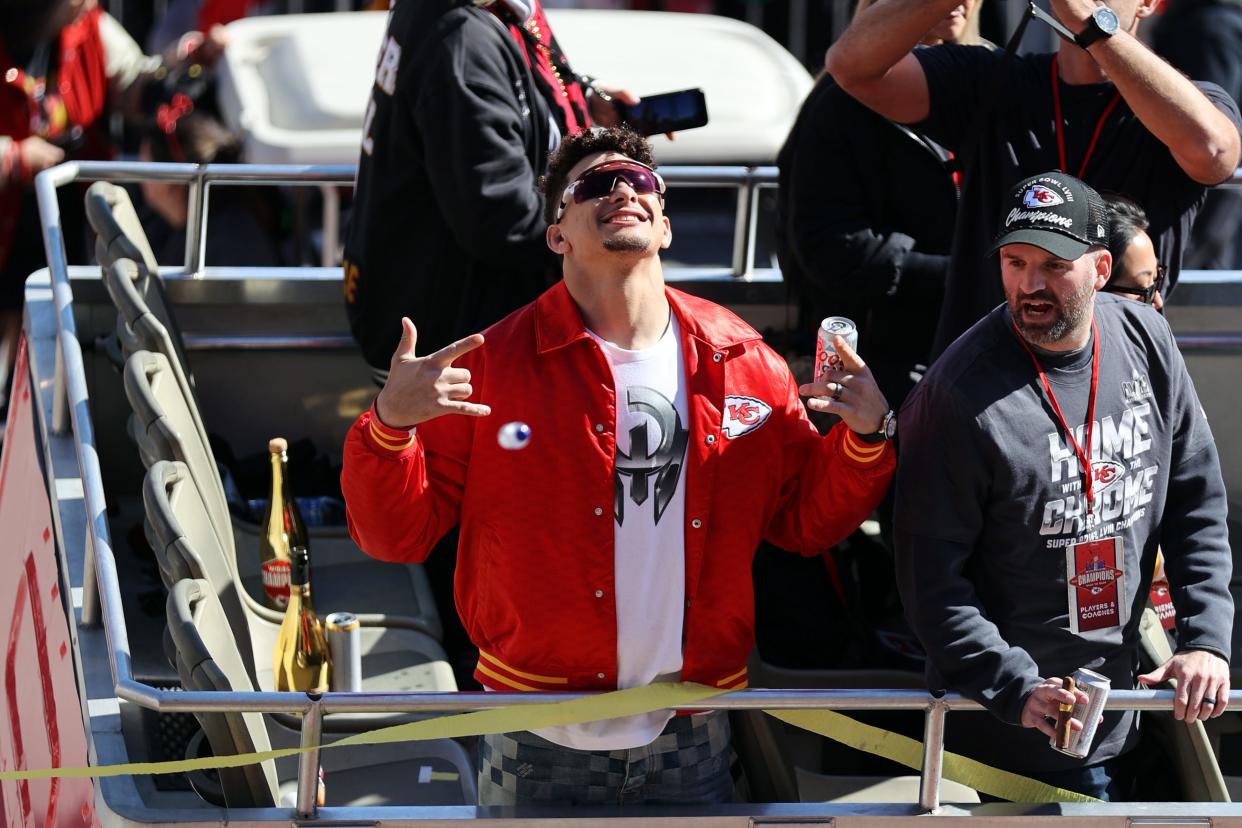 Kansas City Chiefs quarterback Patrick Mahomes celebrates on the bus in the parade during the celebration of the Kansas City Chiefs winning Super Bowl 58 against the San Francisco 49ers in Las Vegas on Feb. 11, 2024.