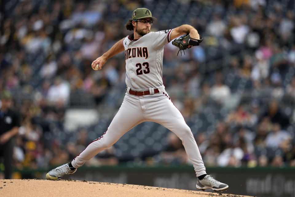 Arizona Diamondbacks starting pitcher Zac Gallen delivers during the first inning of a baseball game against the Pittsburgh Pirates in Pittsburgh, Friday, May 19, 2023. (AP Photo/Gene J. Puskar)