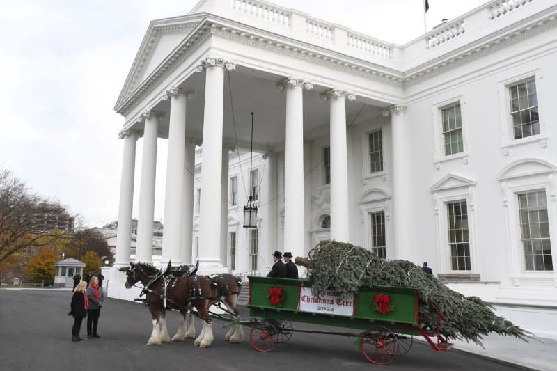 The official 2023 White House Christmas tree was carried by horse and carriage to the front of the North Portico of the White House on Monday in Washington, D.C. The Fraser fir from Fleetwood, North Carolina helps kick off Holiday festivities in the Nation's Capital. Photo by Mike Theiler/UPI