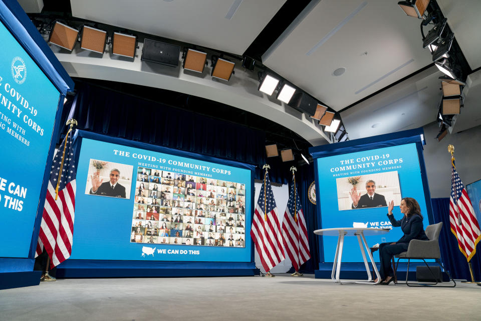 Vice President Kamala Harris waves at the end of a virtual meeting with community leaders to discuss COVID-19 public education efforts in the South Court Auditorium in the Eisenhower Executive Office Building on the White House Campus, Thursday, April 1, 2021, in Washington. (AP Photo/Andrew Harnik)