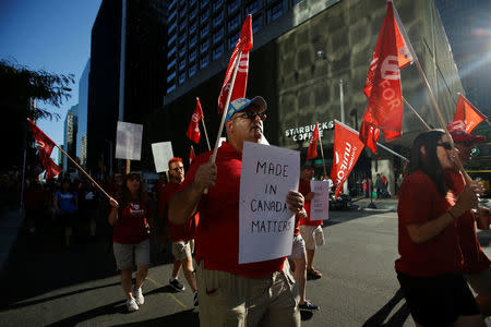 Members of Canada's Unifor union march during a rally ahead of the third round of NAFTA talks involving the United States, Mexico and Canada in Ottawa, Ontario, Canada, September 22, 2017. REUTERS/Chris Wattie