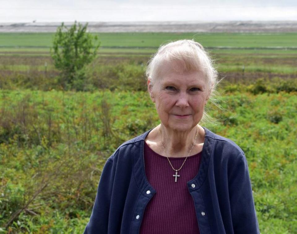 Wilma Subra poses for a portrait in front of Mosaic’s phosphogypsum stack in Convent, Louisiana, Monday, March 13, 2023. 