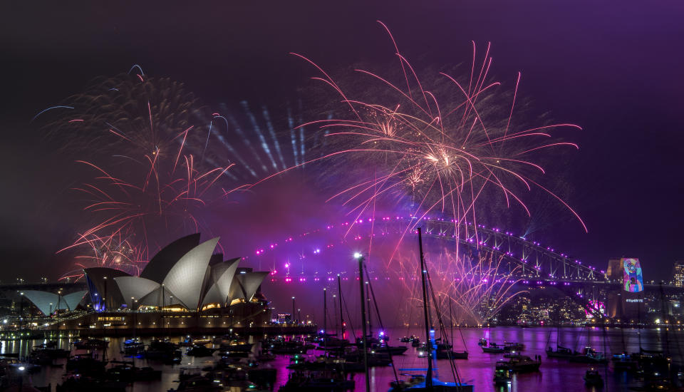 Fireworks explode over the Sydney Harbour during New Year&#39;s Eve celebrations in Sydney, Monday, Dec. 31, 2018. (Brendan Esposito/AAP via AP)