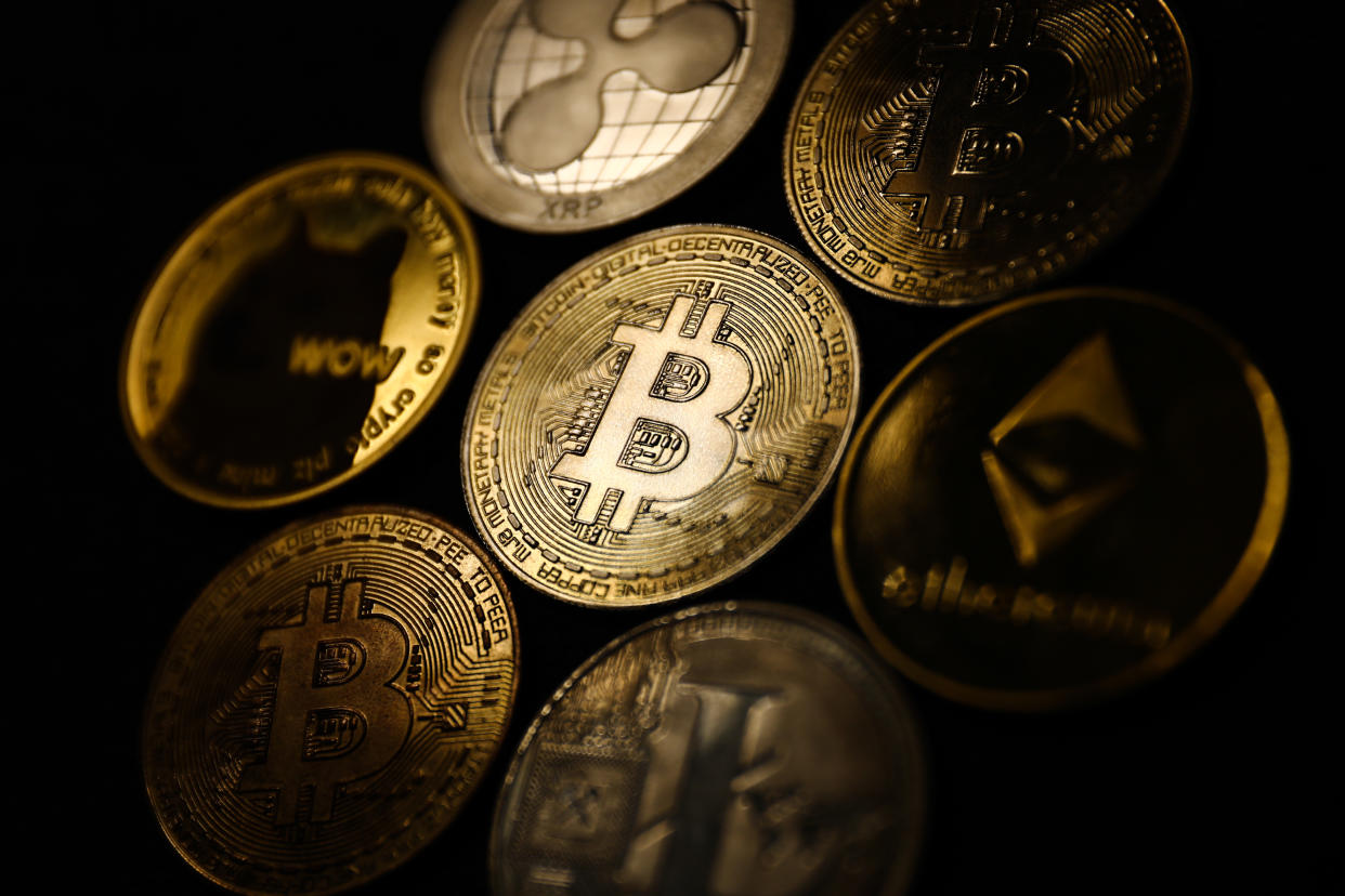 Representation of cryptocurrencies are seen in this illustration photo taken in Krakow, Poland on September 28, 2021. (Photo illustration by Jakub Porzycki/NurPhoto via Getty Images)