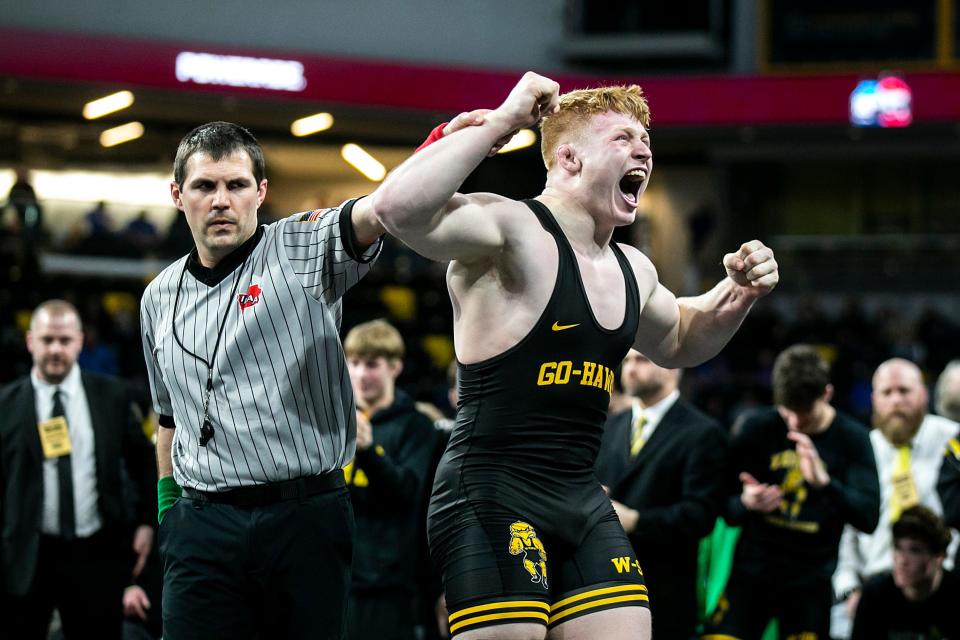 Waverly-Shell Rock's Jake Walker celebrates after scoring a fall at 285 pounds during the boys state wrestling duals against Southeast Polk, Saturday, Feb. 4, 2023, at Xtream Arena in Coralville, Iowa.