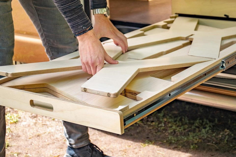 Flat-pack wooden lounge chairs come with the campervan and can be used pretty much anywhere.