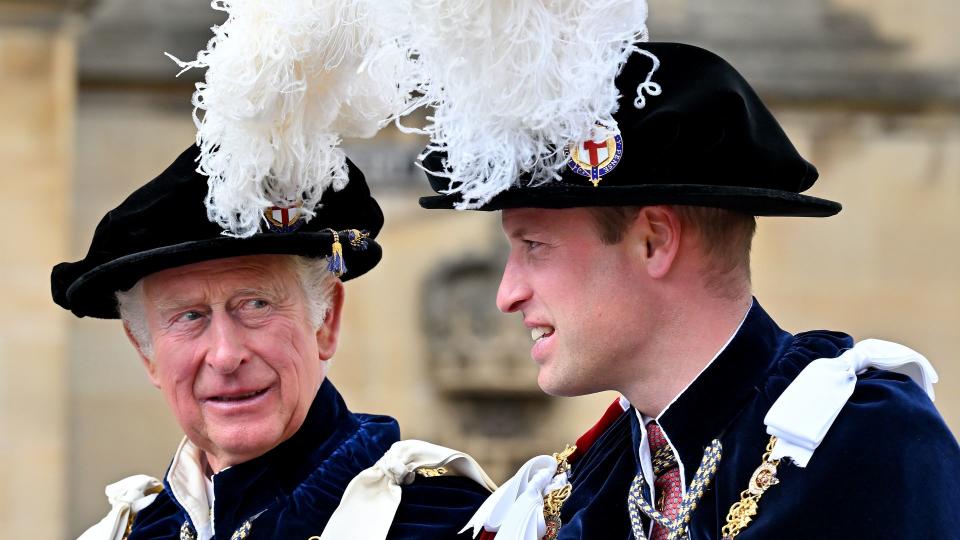 King Charles and Prince William in feathered caps