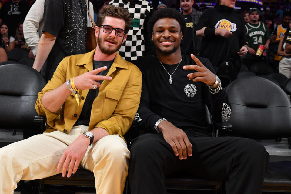 Andrew Garfield and Bronny James attend a basketball game between the Los Angeles Lakers and the Milwaukee Bucks at Crypto.com Arena on October 15, 2023 in Los Angeles, California