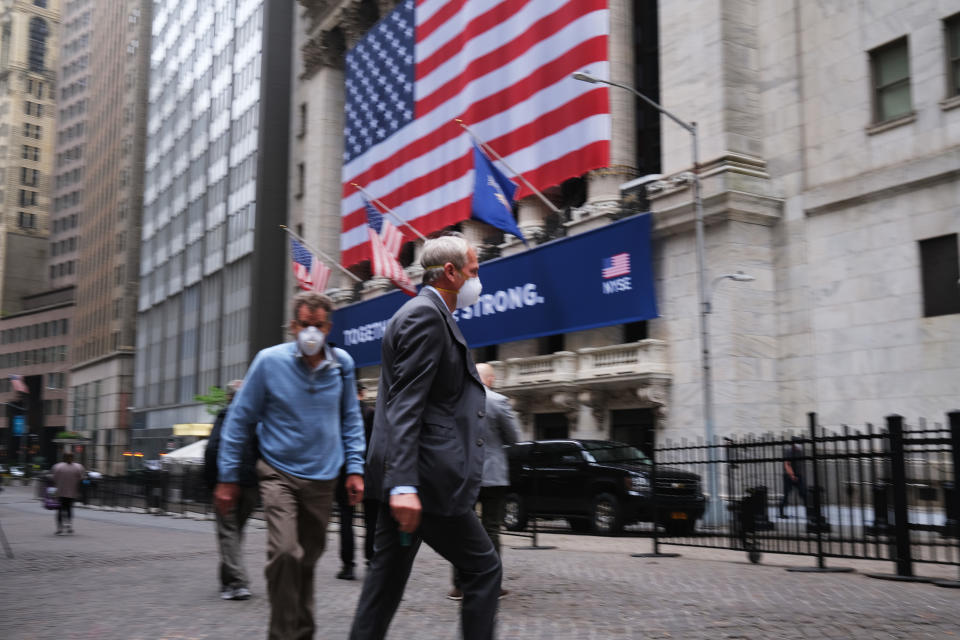 NEW YORK, NEW YORK - MAY 26: The New York Stock Exchange (NYSE) stands in lower Manhattan on the first day that traders are allowed back onto the historic floor of the exchange on May 26, 2020 in New York City. While only a small number of traders will be returning at this time, those that do will have to take temperature checks and wear face masks at all times while on the floor. The Dow rose over 600 points in morning trading as investors see economic activity in America picking up (Photo by Spencer Platt/Getty Images)