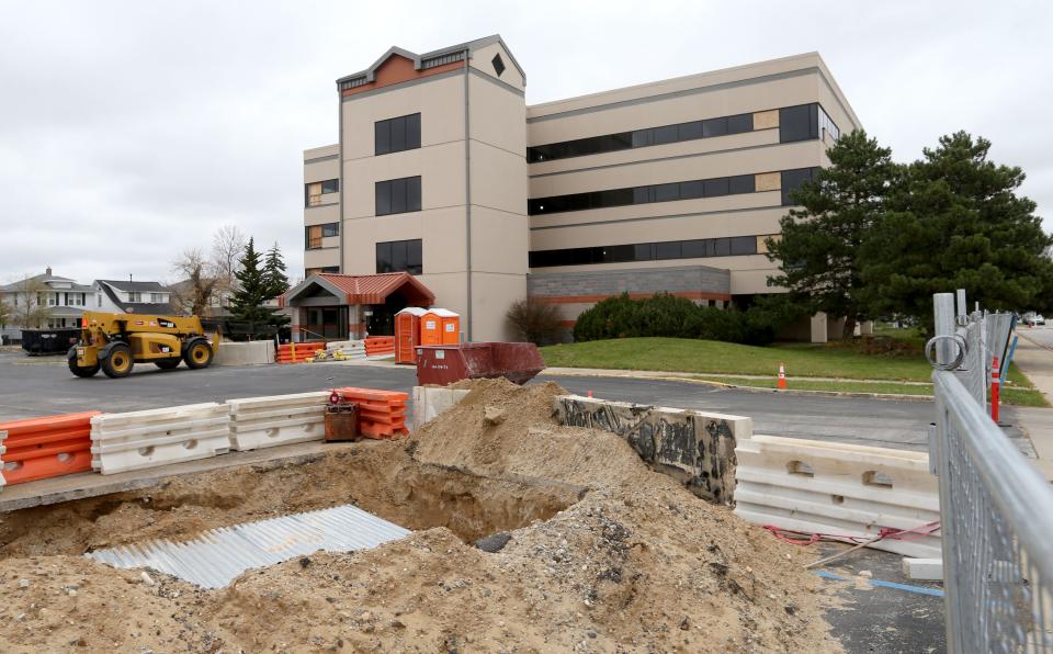 This former medical office building, seen here on Friday, Nov. 11, 2022, at 511 N. Notre Dame Ave., is being renovated into an apartment complex in South Bend.