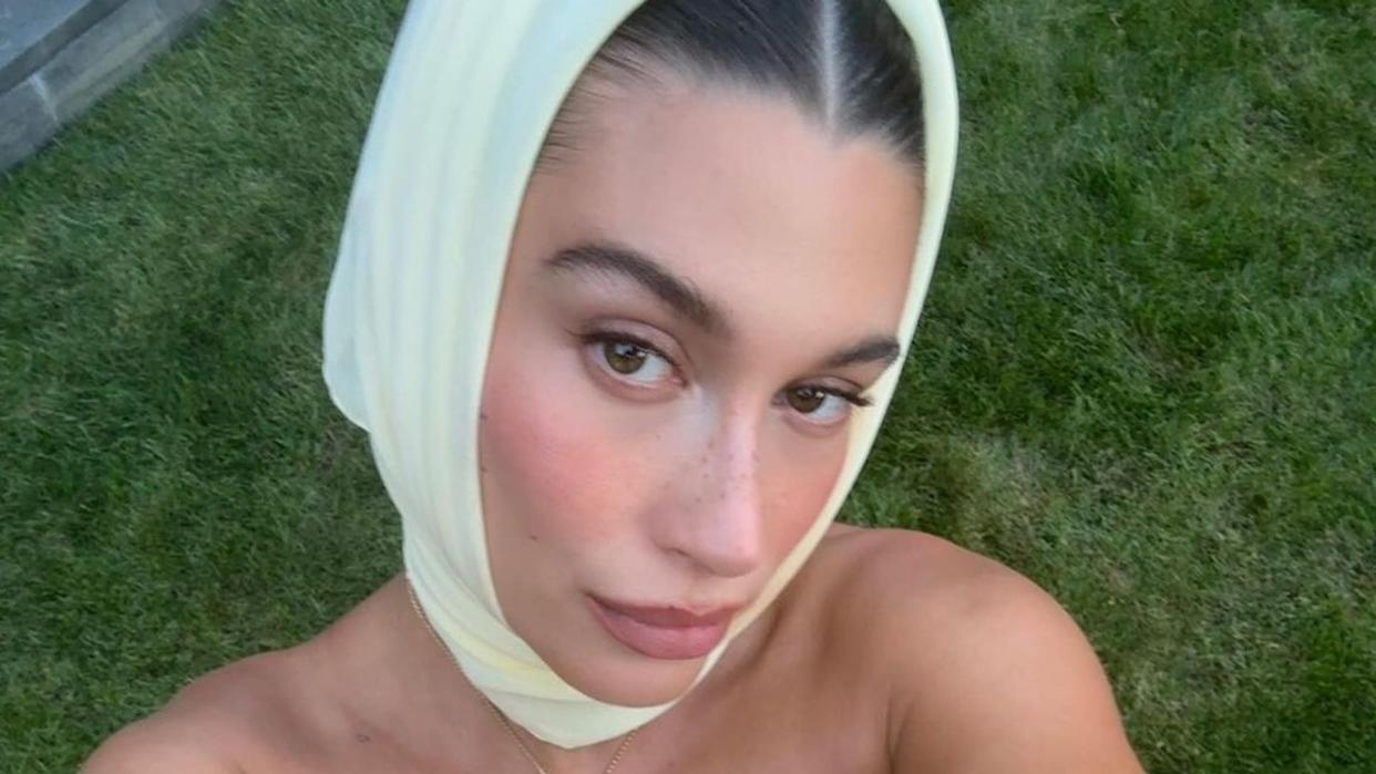 Hailey Bieber wears lemon yellow maternity dress