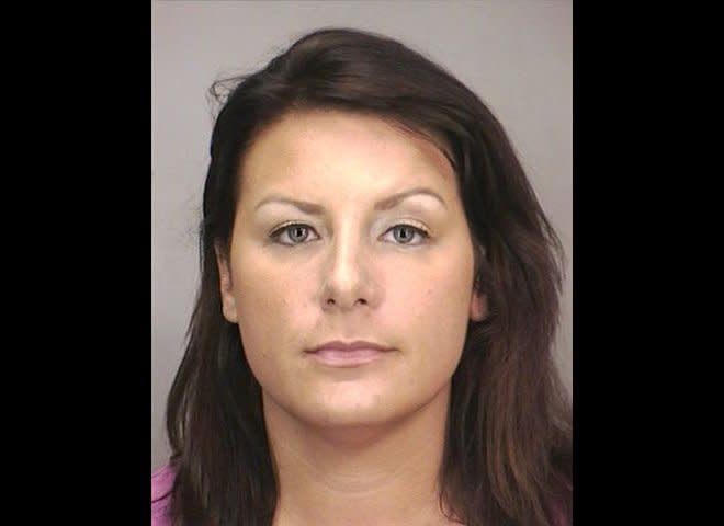 In this Aug. 5, 2011 photo released by the Nassau County Police Department in Garden City, N.Y., New York City English teacher Tara Driscoll is shown. Driscoll, 33, pleaded guilty to having sex with a student who attended the high school where she worked. She was sentenced to six years probation. (AP Photo/Nassau County Police Department)