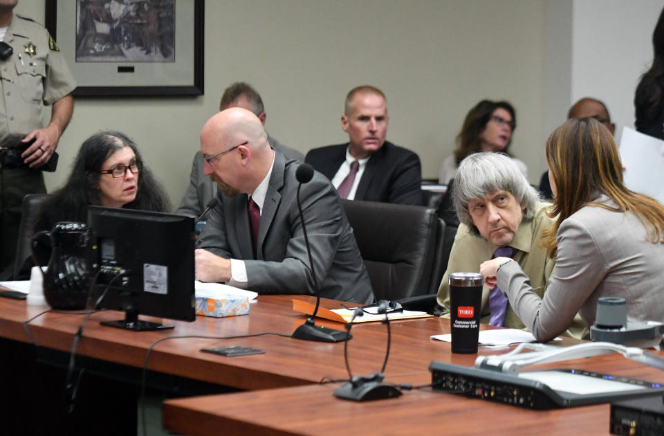 Image: Louise and Daivd Turpin speak with their attorneys in court for their sentencing in Riverside, California on April 19, 2019. (Will Lester / AFP - Getty Images file)