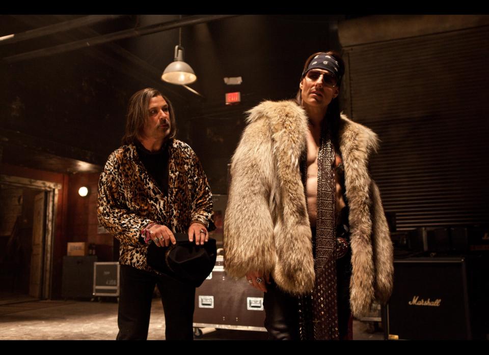 Alec Baldwin as Dennis Dupree, left, and Tom Cruise as Stacee Jaxx in  the film "Rock of Ages."