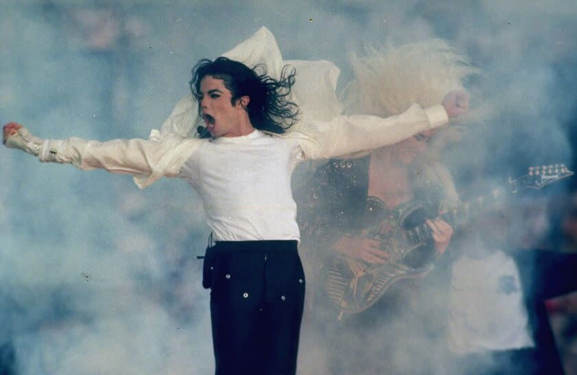 FILE - In this Jan. 31, 1993, file photo, Michael Jackson performs during the halftime show at the Super Bowl XXVII in Pasadena, Calif. Jackson's estate and IMAX are partnering to digitally remaster "Michael Jackson's Thriller 3D" into IMAX 3D. The partnership was announced Wednesday, Aug. 29, 2018, which would have been the singer's 60th birthday. It will be released in IMAX theaters across the U.S. for one week beginning on Sept. 21. (AP Photo/Rusty Kennedy, File)