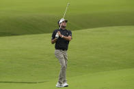 Bubba Watson hits from the fairway on the 16th hole during the third round of the PGA Championship golf tournament at Southern Hills Country Club, Saturday, May 21, 2022, in Tulsa, Okla. (AP Photo/Matt York)