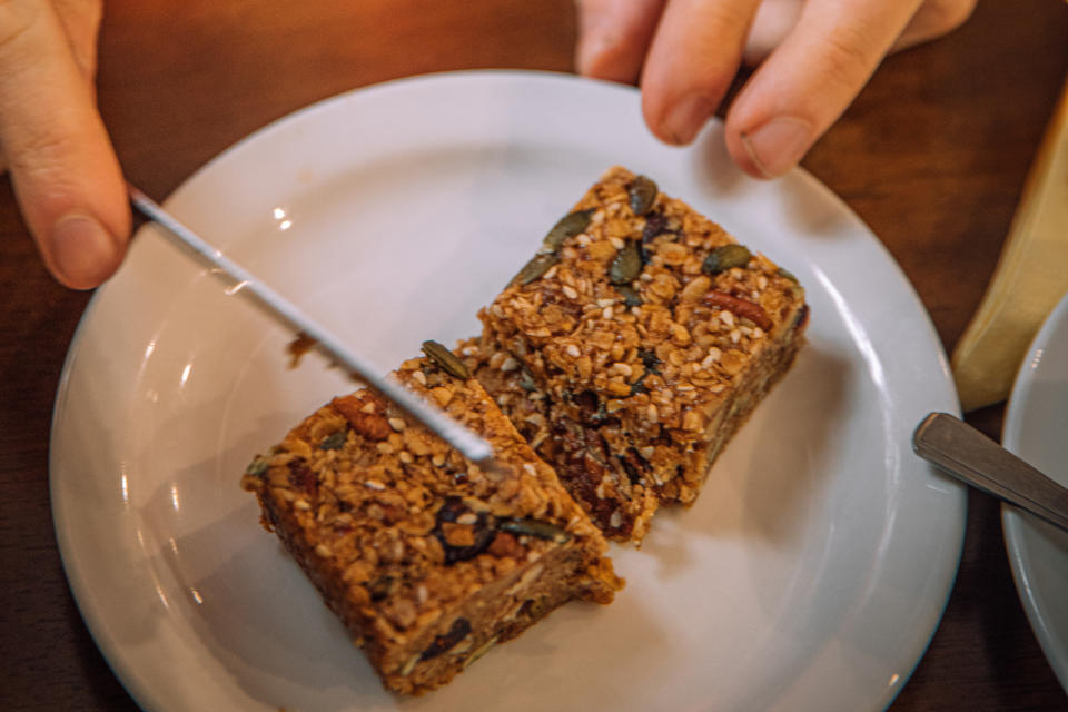 Image shows rider eating a flapjack.