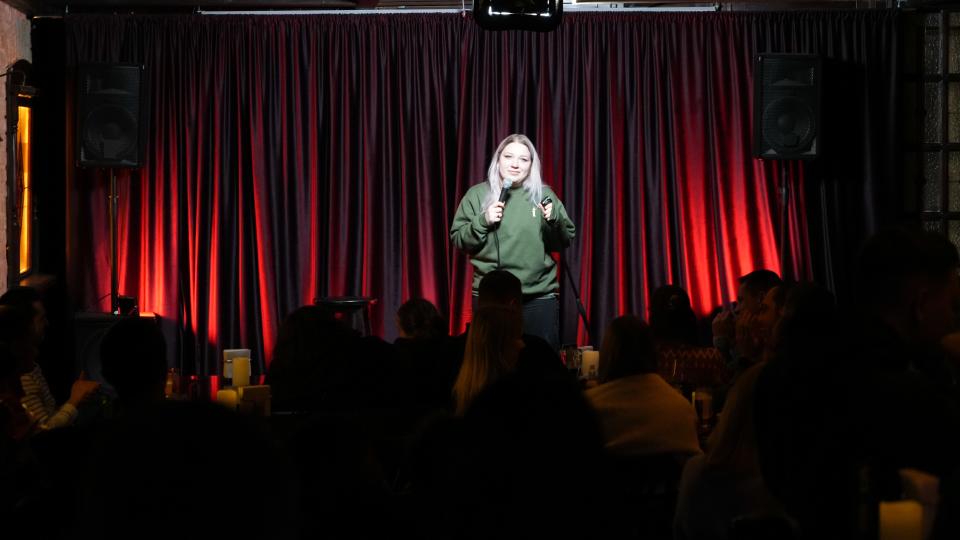 Ukrainian comedian Anya Kochegura performs at Kyiv's Underground Standup Club, in Ukraine's capital on Feb. 8.