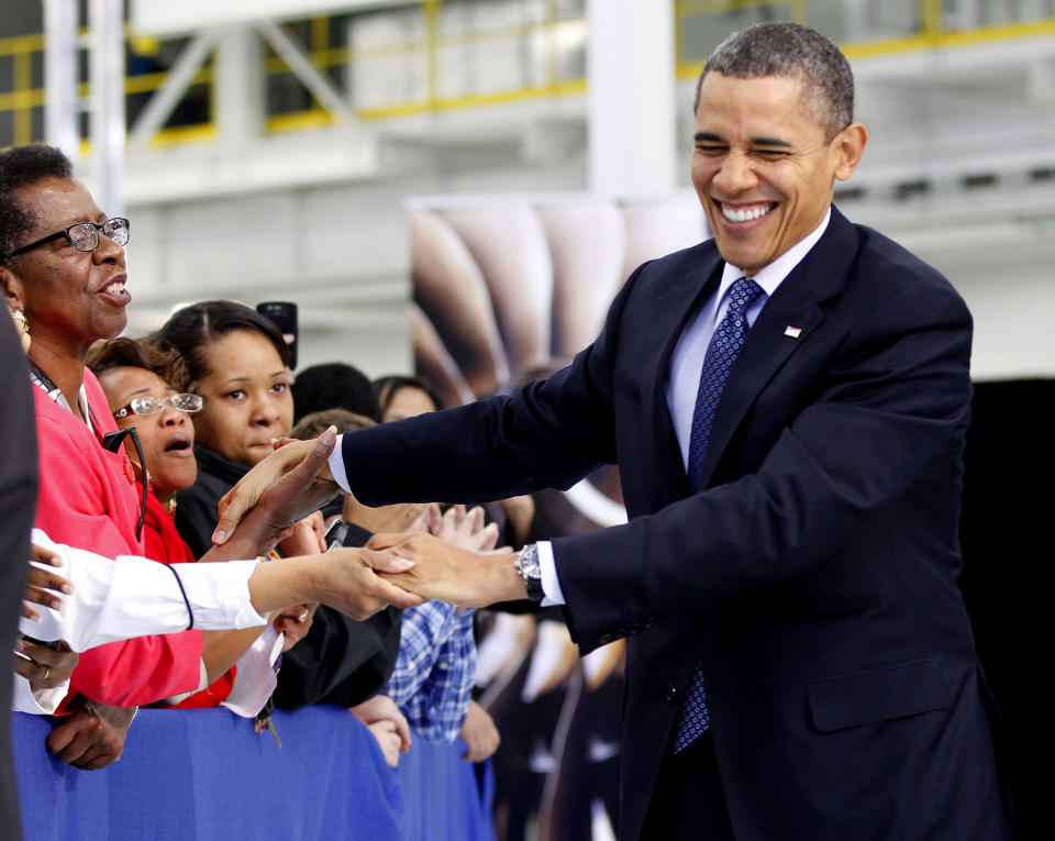 President Barack Obama greet guests at the Rolls-Royce Crosspointe jet engine disc manufacturing facility, Friday, March, 9, 2012, in Prince George, Va. Crosspoint facility manufactures precision-engineered engine disc and other components for aircrafts. (AP Photo/Pablo Martinez Monsivais)