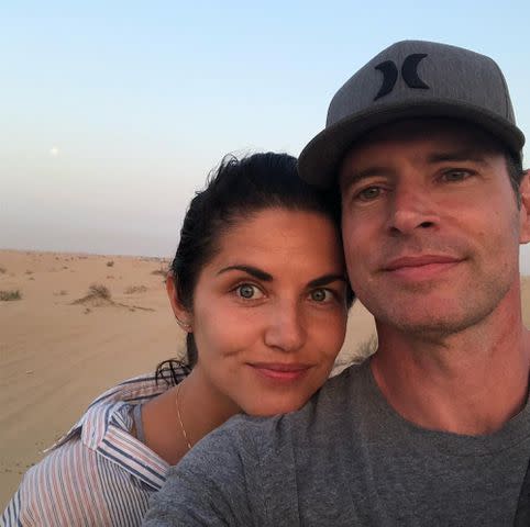 <p>Marika Dominiczyk Instagram</p> Scott Foley and his wife, Marika Dominiczyk, take a selfie outdoors.