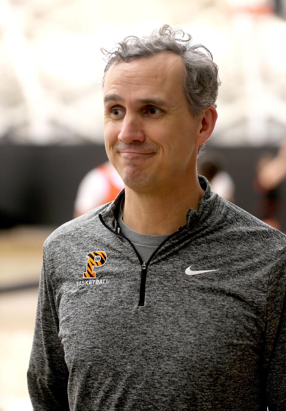 Princeton University Head Coach Mitch Henderson speaks with the media gathered at the University's Jadwin Gym Monday afternoon, March 20, 2023.  The team were preparing for their NCAA Sweet 16 appearance.