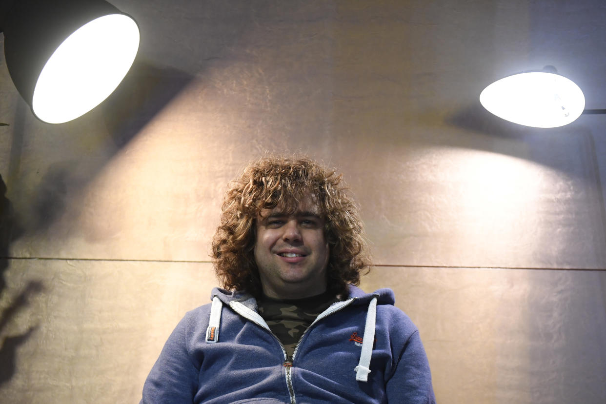 British singer Daniel Wakeford, who is autistic, poses during a photo session at Le Liberte music hall in Rennes on December 9, 2017, on the sidelines of the 39th edition of the Trans Musicales music festival.
Diagnosed with autism at age 9, Daniel Wakeford has been writing and recording songs since he was 22 years old. Supported by Carousel, an organization that helps artists with learning disabilities, he has accumulated an impressive repertoire of tracks. On television and music stages in Britain, he has become a star thanks to his pop songs. / AFP PHOTO / DAMIEN MEYER        (Photo credit should read DAMIEN MEYER/AFP via Getty Images)