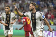 Germany's Niclas Fuellkrug celebrates after he scored his side's first goal during the World Cup group E soccer match between Spain and Germany, at the Al Bayt Stadium in Al Khor , Qatar, Sunday, Nov. 27, 2022. (AP Photo/Luca Bruno)