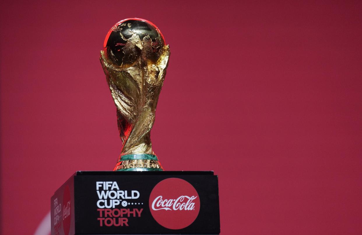 The Qatar FIFA World Cup trophy is on display during the Trophy Tour by Coca-Cola kick-off today with a first-stop event in Dubai, United Arab Emirates, Thursday, May 12, 2022. 