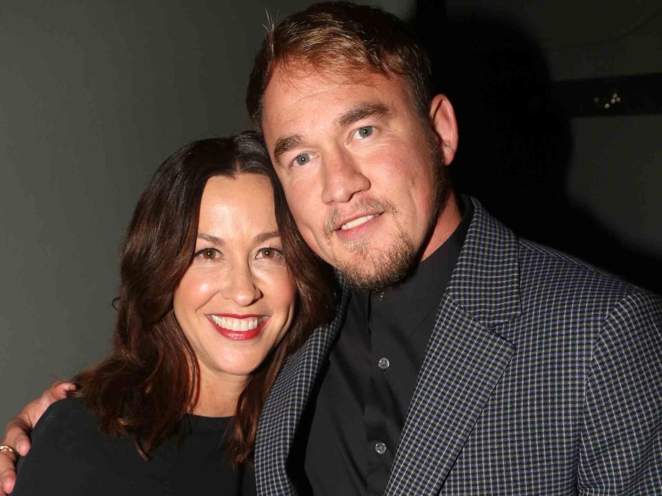 <p>Bruce Glikas/FilmMagic</p> Alanis Morissette and Mario "Souleye" Treadway pose at the opening night of the new Alanis Morissette musical "Jagged Little Pill" on Broadway at The Broadhurst Theatre on December 5, 2019 in New York City. 