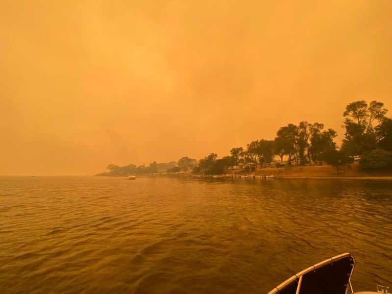 FILE PHOTO: A view shows smoke from wild bushfires engulfing the sky in Mallacoota