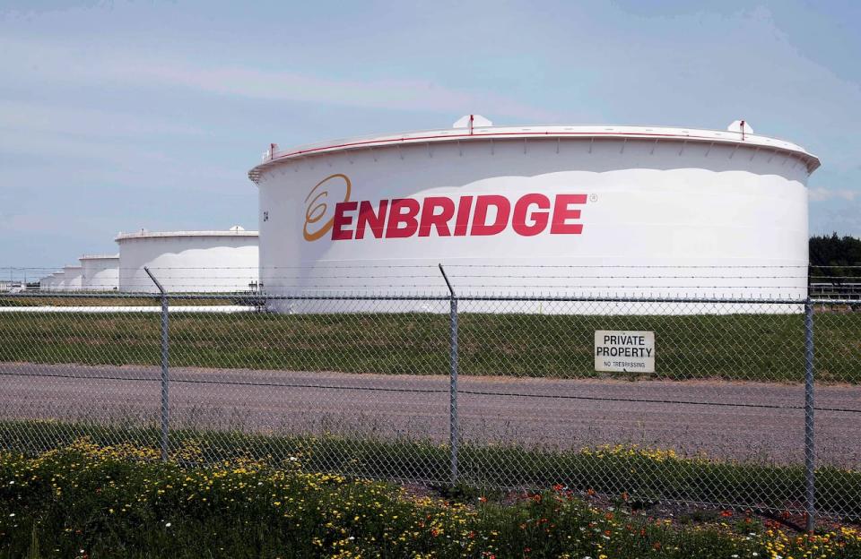 This June 29, 2018 photo shows tanks at the Enbridge Energy terminal in Superior, Wis. For the second time in a year, the federal government is invoking a little-known 1977 energy treaty between Canada and the United States to defend the Line 5 pipeline. This time, it’s in Wisconsin, where Line 5 skirts the southwestern shores of Lake Superior before crossing into Michigan. THE CANADIAN PRESS/AP-Jim Mone