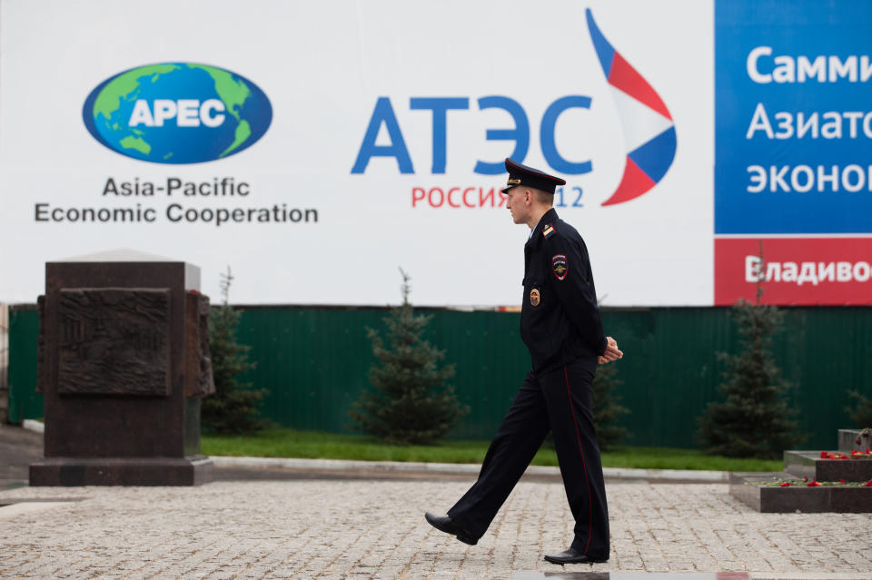 A police officer patrols the central business district of Vladivostok, Russia, Saturday, Sept. 8, 2012. Leaders from the APEC countries are attending their annual summit in the eastern Russian city till Sept. 9. (AP Photo/Alexander Khitrov)